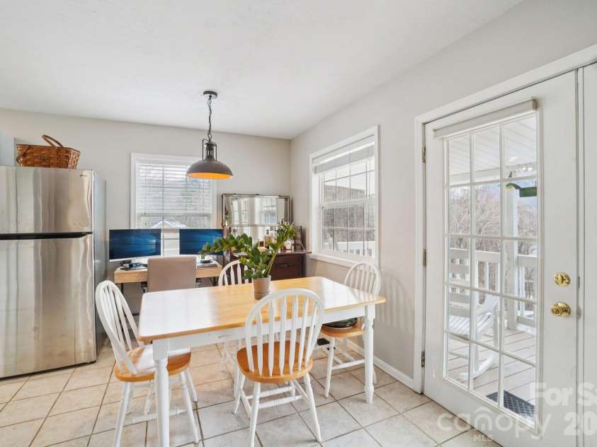 130 Sherwood Drive, Lake Lure, NC 28746.  MLS# CAR4437633, YatesRealty ID 58459. Sunny dining area
