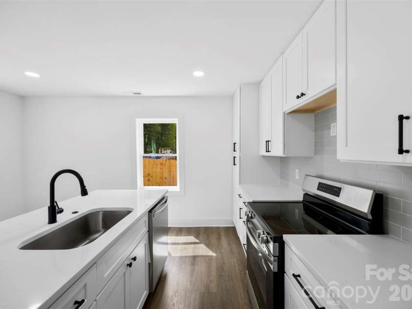 2942 Reid Avenue, Charlotte, NC 28208.  MLS# CAR4437077, YatesRealty ID 58487. 
