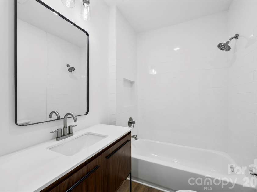 2942 Reid Avenue, Charlotte, NC 28208.  MLS# CAR4437077, YatesRealty ID 58487. Full bathroom with shower/tub combo