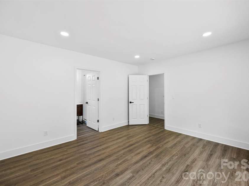 2942 Reid Avenue, Charlotte, NC 28208.  MLS# CAR4437077, YatesRealty ID 58487. Primary bedroom.
