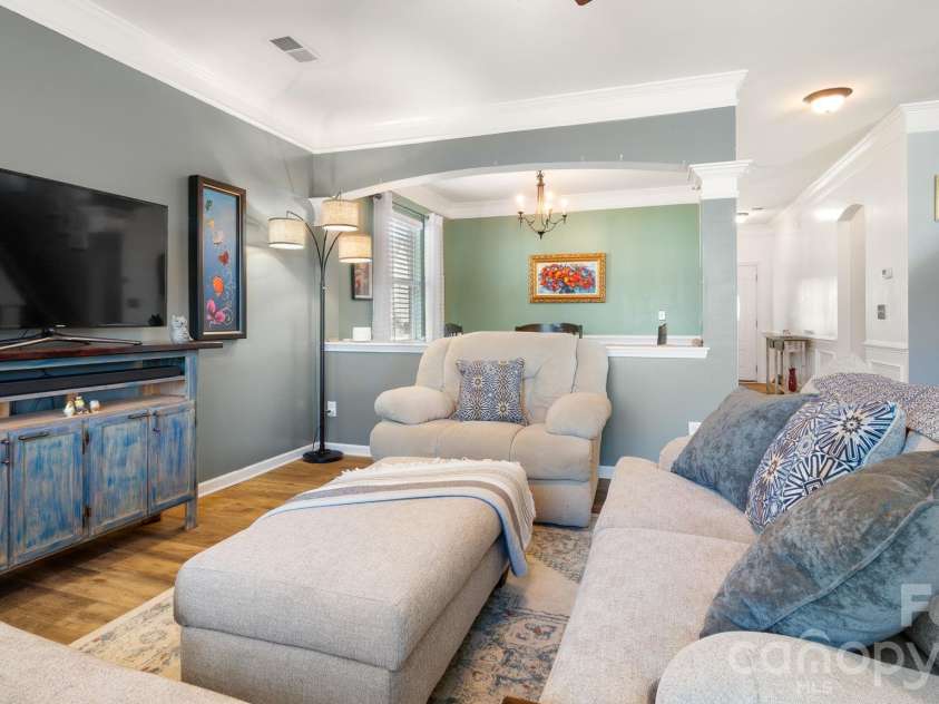 1232 New River Drive, Concord, NC 28025.  MLS# CAR4436783, YatesRealty ID 58494. Living flows to dining and kitchen