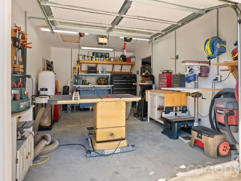 1232 New River Drive, Concord, NC 28025.  MLS# CAR4436783, YatesRealty ID 58494. Third car garage! Currently being used as a workshop...plus utility sink!