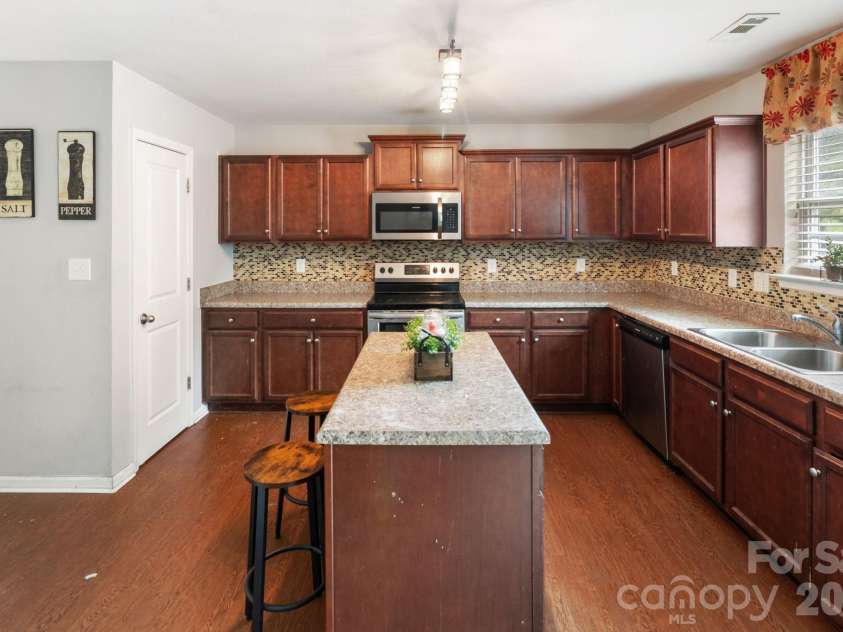 4012 Long Arrow Drive, Concord, NC 28025.  MLS# CAR4437288, YatesRealty ID 58514. 