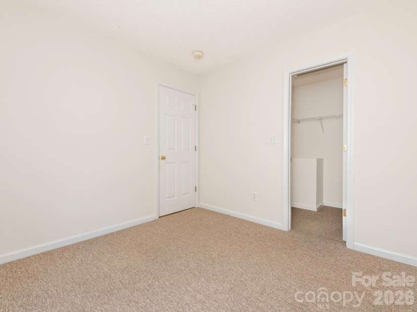 239 Candle Court, Concord, NC 28027.  MLS# CAR4429401, YatesRealty ID 58524. Bedroom #3 with WIC
