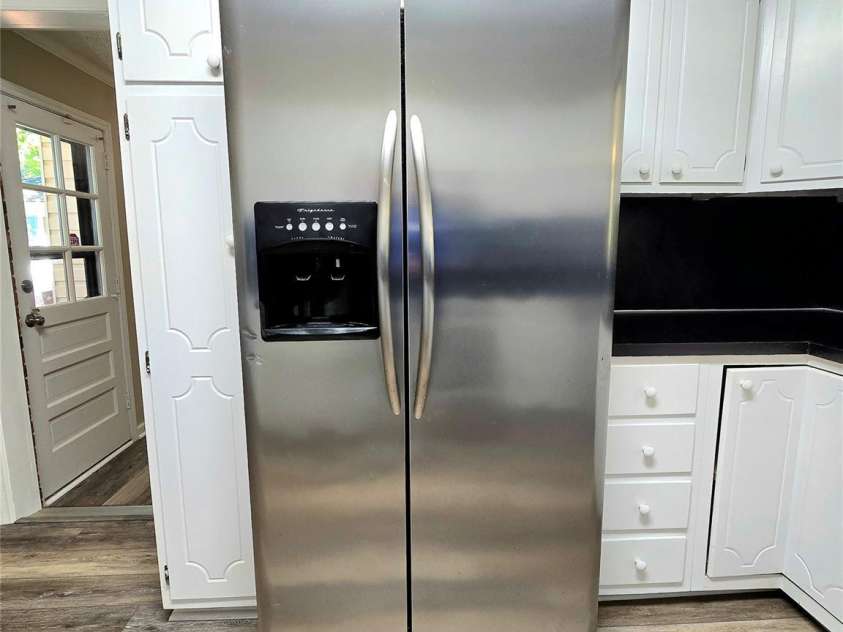 112 Wendover Drive, Lincolnton, NC 28092.  MLS# CAR4437712, YatesRealty ID 58555. Stainless side by side refrigerator with ice and water hook up