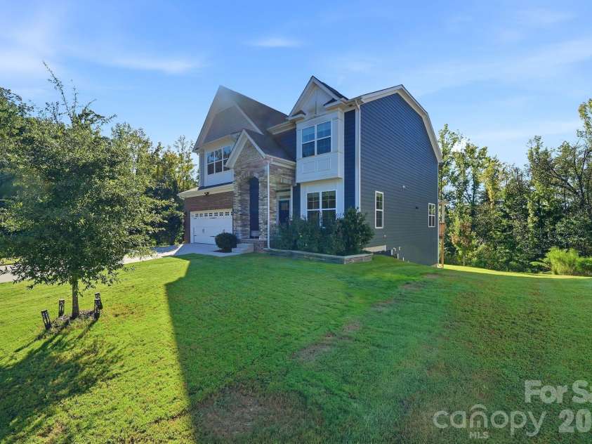 4603 Monument Valley Drive, Indian Land, SC 29707.  MLS# CAR4433542, YatesRealty ID 58574. Front/side of home