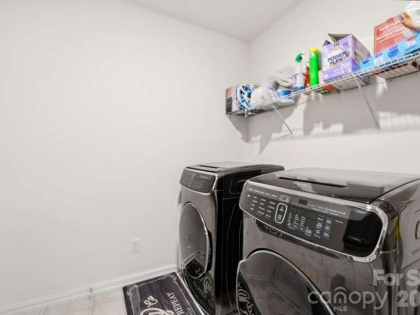 4603 Monument Valley Drive, Indian Land, SC 29707.  MLS# CAR4433542, YatesRealty ID 58574. Laundry room off garage