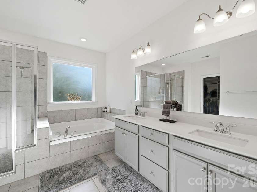 4603 Monument Valley Drive, Indian Land, SC 29707.  MLS# CAR4433542, YatesRealty ID 58574. Spa like bathroom