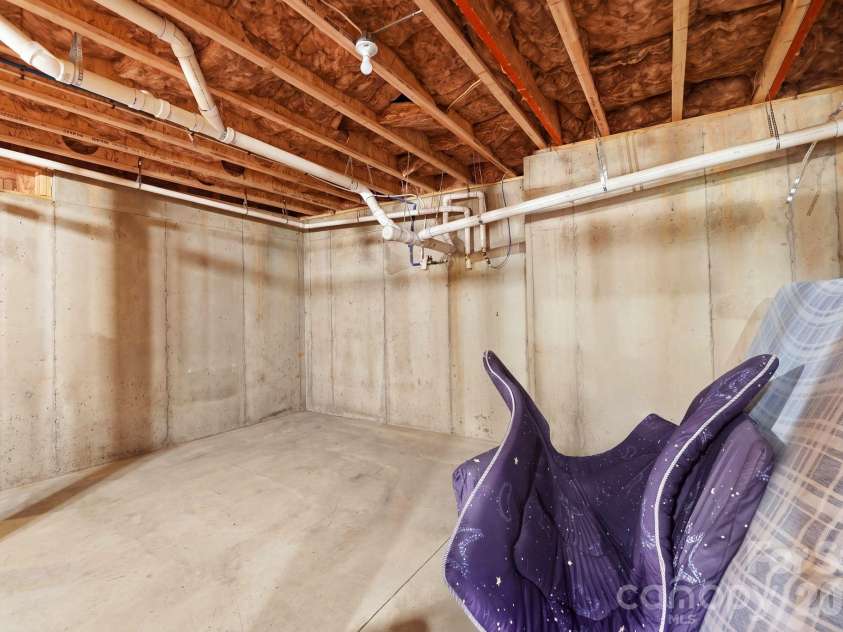 4603 Monument Valley Drive, Indian Land, SC 29707.  MLS# CAR4433542, YatesRealty ID 58574. Unfinished basement area