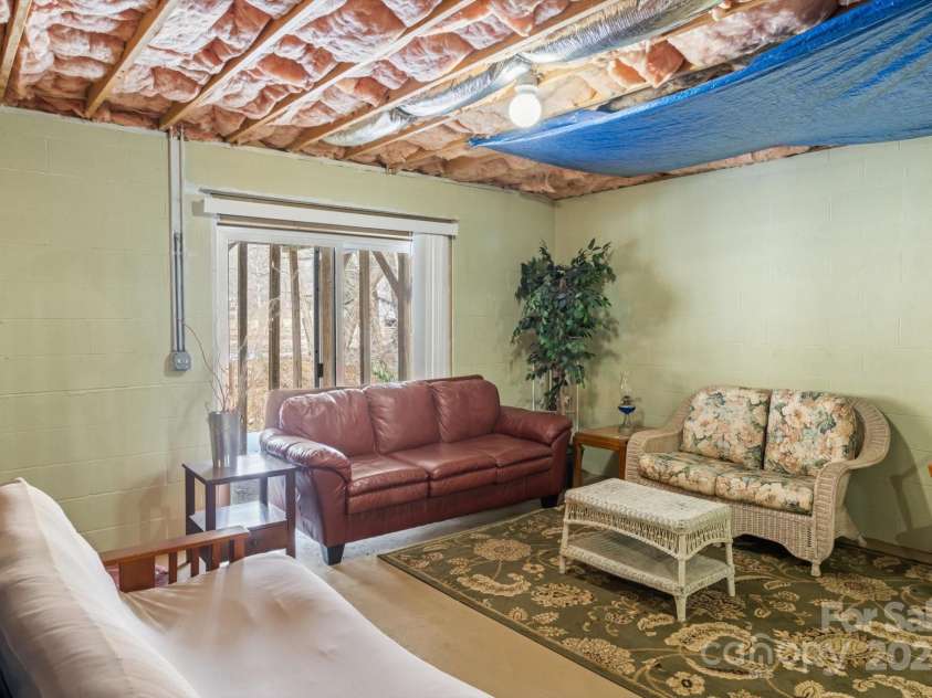 284 Caldwell Drive, Maggie Valley, NC 28751.  MLS# CAR4218982, YatesRealty ID 5858. Basement