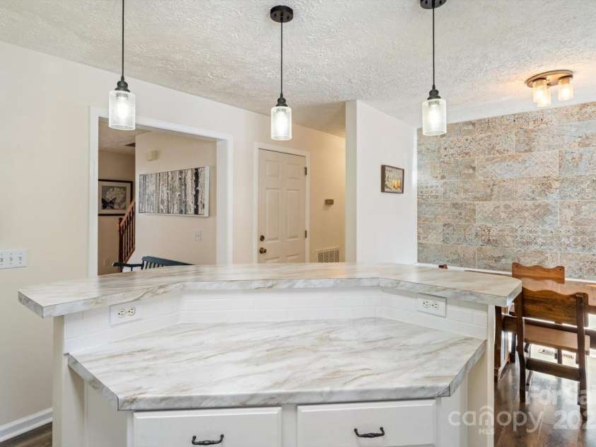 284 Caldwell Drive, Maggie Valley, NC 28751.  MLS# CAR4218982, YatesRealty ID 5858. Main Floor Kitchen Island