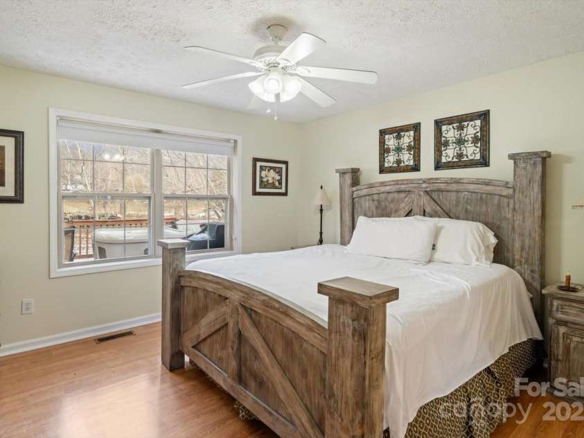 284 Caldwell Drive, Maggie Valley, NC 28751.  MLS# CAR4218982, YatesRealty ID 5858. Main Floor  Primary Bedroom
