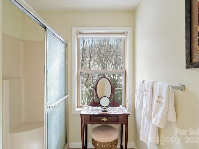 284 Caldwell Drive, Maggie Valley, NC 28751.  MLS# CAR4218982, YatesRealty ID 5858. Primary Bedroom Ensuite