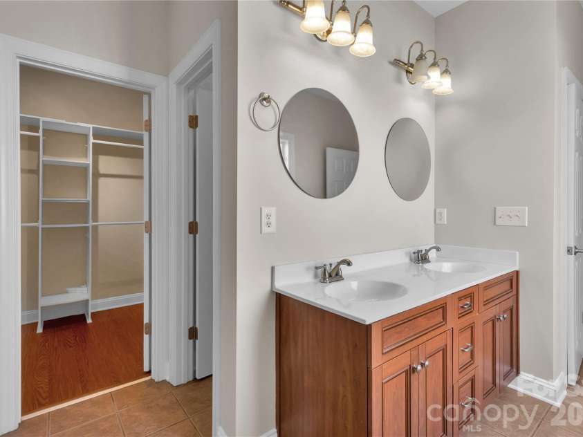 1240 Saint Johns Avenue, Matthews, NC 28104.  MLS# CAR4432333, YatesRealty ID 58630. Primary Bath & large Walk-in closet