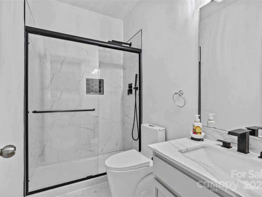 3008 Dundee Lane, Fort Mill, SC 29707.  MLS# CAR4223357, YatesRealty ID 5868. Downstairs full bath
