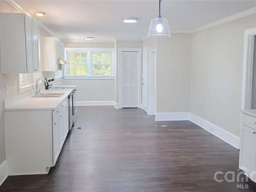 1107/1111 Chase High Road, Forest City, NC 28043.  MLS# CAR4438038, YatesRealty ID 58708. 1111 Kitchen View 2