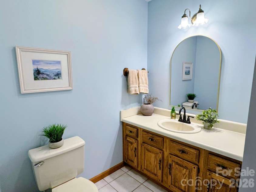 352 Bolt Road, Lake Lure, NC 28746.  MLS# CAR4305332, YatesRealty ID 5872. 13-Guest half bathroom