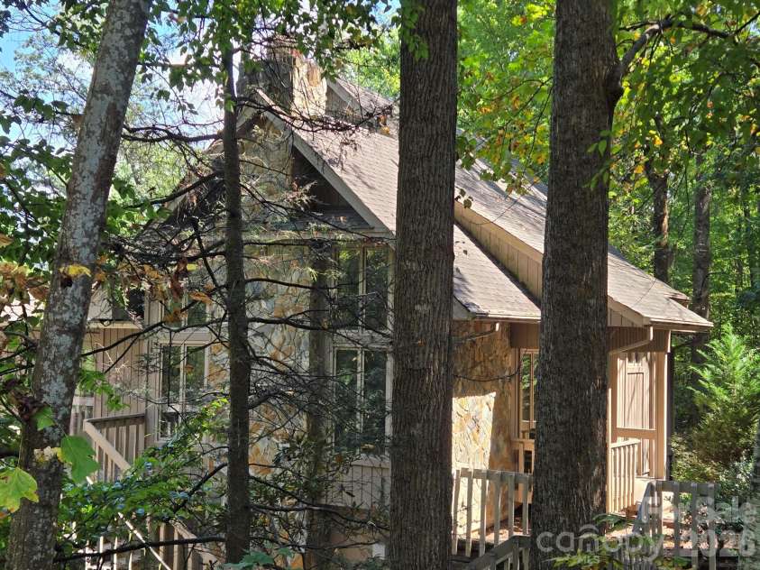 352 Bolt Road, Lake Lure, NC 28746.  MLS# CAR4305332, YatesRealty ID 5872. 16-Exterior side view