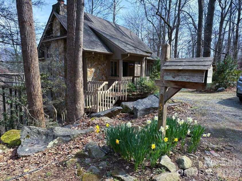 352 Bolt Road, Lake Lure, NC 28746.  MLS# CAR4305332, YatesRealty ID 5872. 4-Exterior side view
