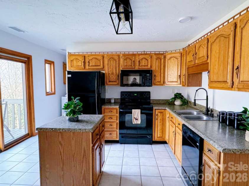 352 Bolt Road, Lake Lure, NC 28746.  MLS# CAR4305332, YatesRealty ID 5872. 6-Kitchen