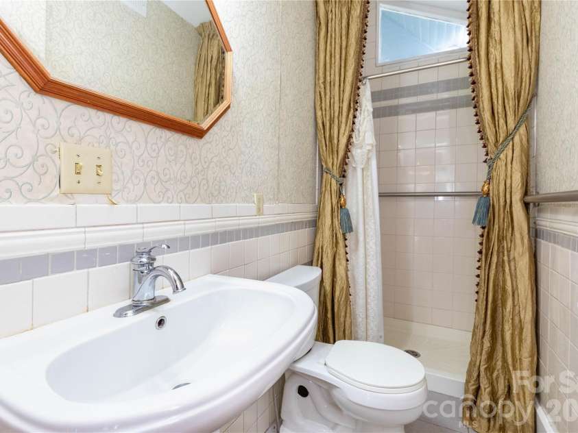 10 Best Life Lane, Brevard, NC 28712.  MLS# CAR4437749, YatesRealty ID 58772. Bathroom/ 1st floor