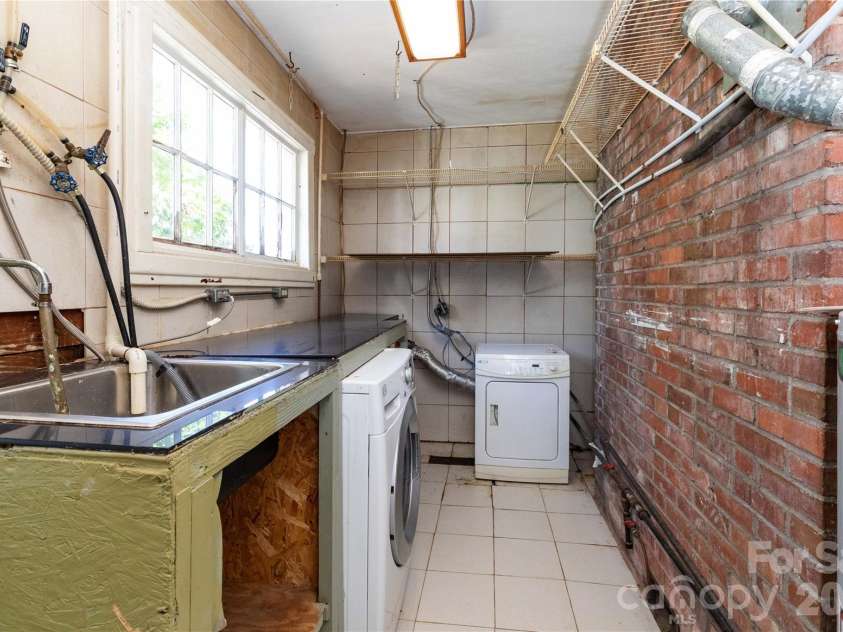 10 Best Life Lane, Brevard, NC 28712.  MLS# CAR4437749, YatesRealty ID 58772. Laundry room/ Utility Room