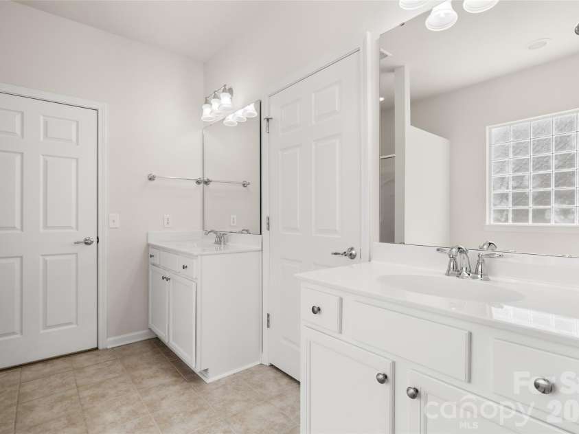 1058 Mesa Verde Drive, Indian Land, SC 29707.  MLS# CAR4408157, YatesRealty ID 58806. Primary bath w/ dual sinks