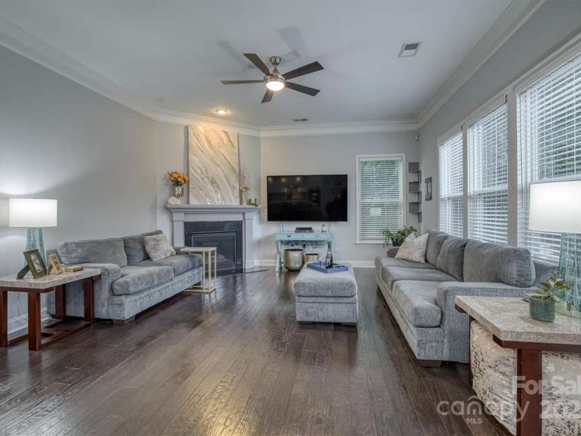375 Montibello Drive, Mooresville, NC 28117.  MLS# CAR4220480, YatesRealty ID 5881. Den with Gas FP