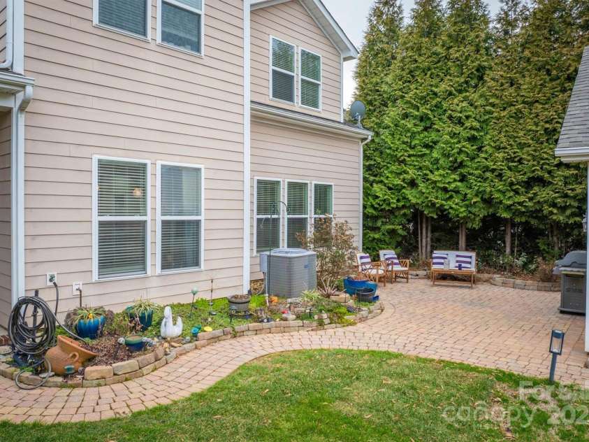 375 Montibello Drive, Mooresville, NC 28117.  MLS# CAR4220480, YatesRealty ID 5881. Enjoy Evenings on Bricked Patio