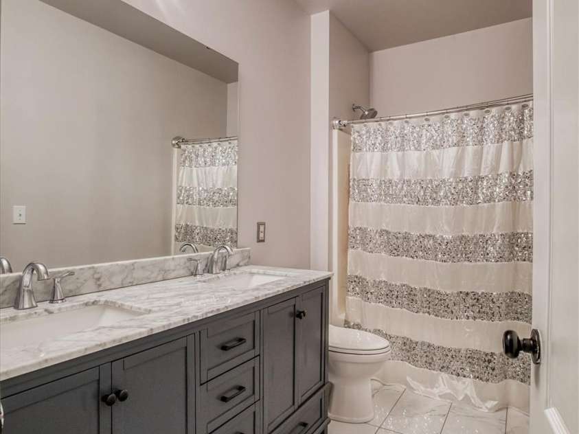 375 Montibello Drive, Mooresville, NC 28117.  MLS# CAR4220480, YatesRealty ID 5881. Hall Bath with Dual Vanities