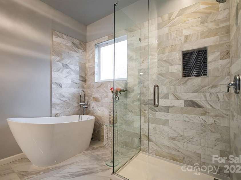 375 Montibello Drive, Mooresville, NC 28117.  MLS# CAR4220480, YatesRealty ID 5881. Soaking tub and Large Walkin Shower