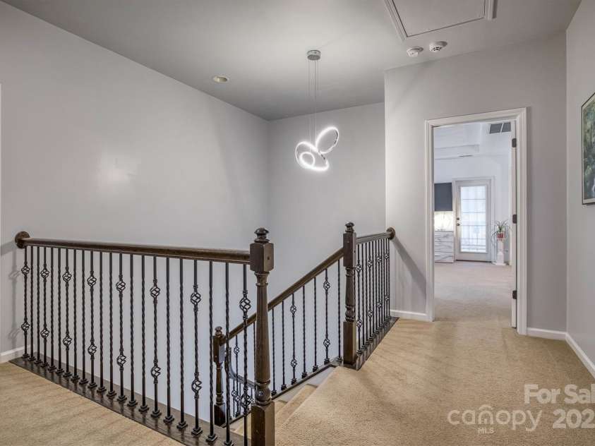 375 Montibello Drive, Mooresville, NC 28117.  MLS# CAR4220480, YatesRealty ID 5881. Upstairs Landing with  Upstairs Laundry Room