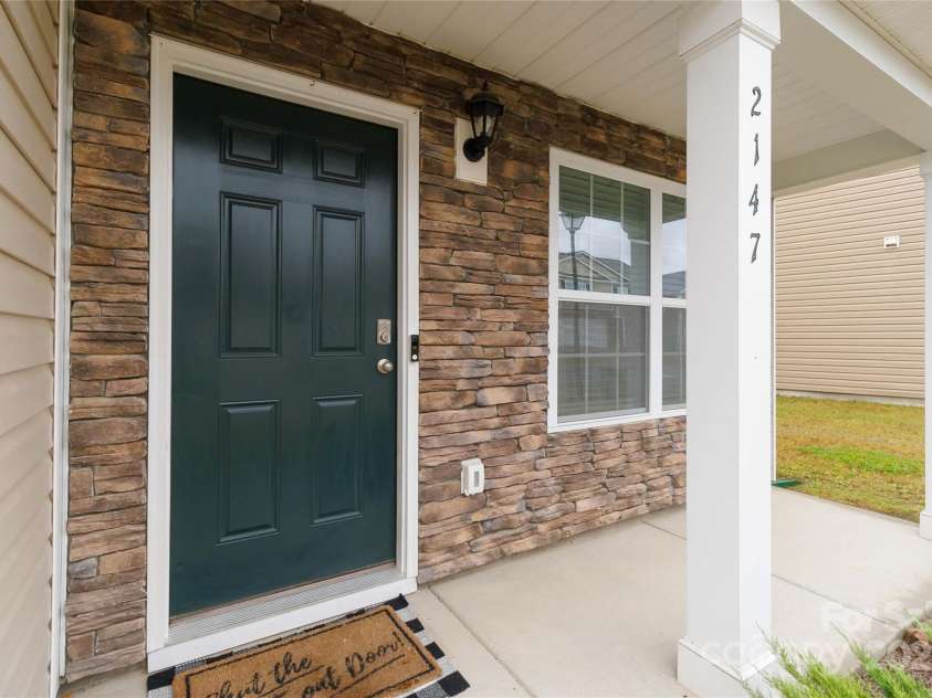 2147 Eastway Drive, Dallas, NC 28034.  MLS# CAR4313585, YatesRealty ID 5895. Front porch
