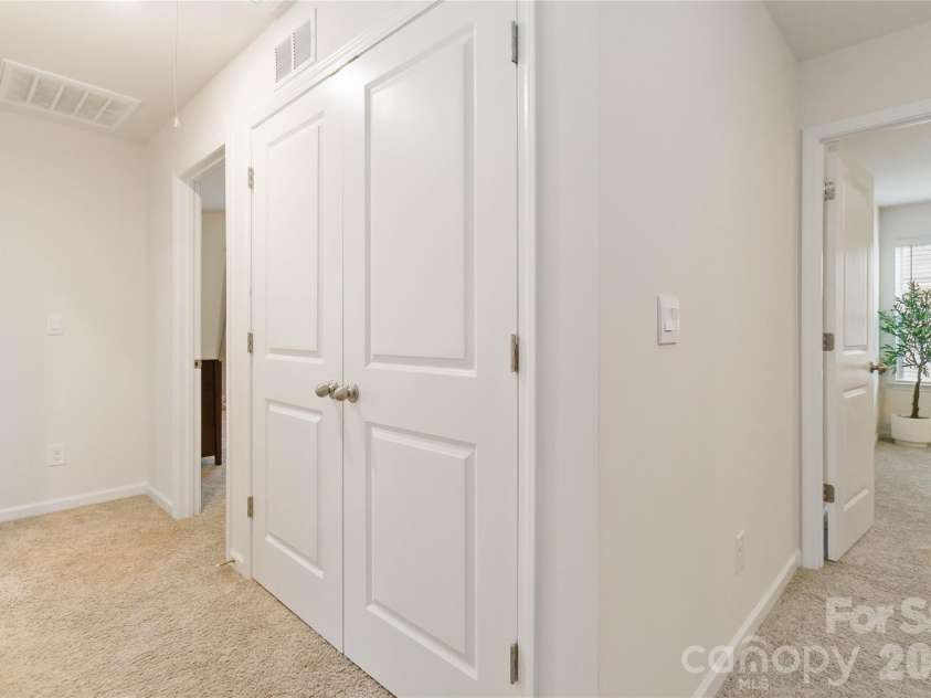 2147 Eastway Drive, Dallas, NC 28034.  MLS# CAR4313585, YatesRealty ID 5895. Laundry in upstairs hallway for easy access