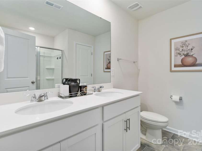 2147 Eastway Drive, Dallas, NC 28034.  MLS# CAR4313585, YatesRealty ID 5895. Primary bath with double sinks