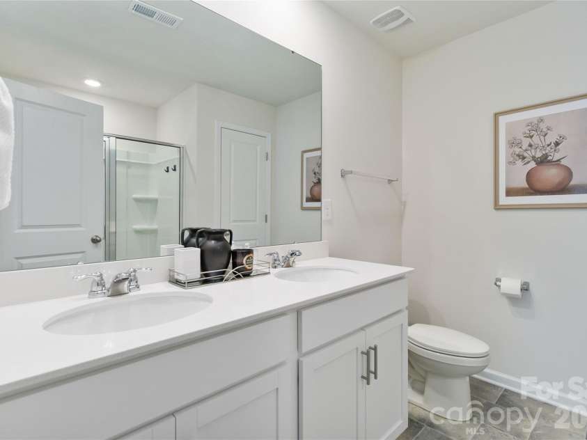 2147 Eastway Drive, Dallas, NC 28034.  MLS# CAR4313585, YatesRealty ID 5895. Primary bath with double sinks