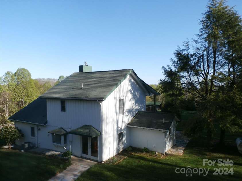 288 Firetower Road, Spruce Pine, NC 28777.  MLS# CAR4135750, YatesRealty ID 5896. Back view of house
