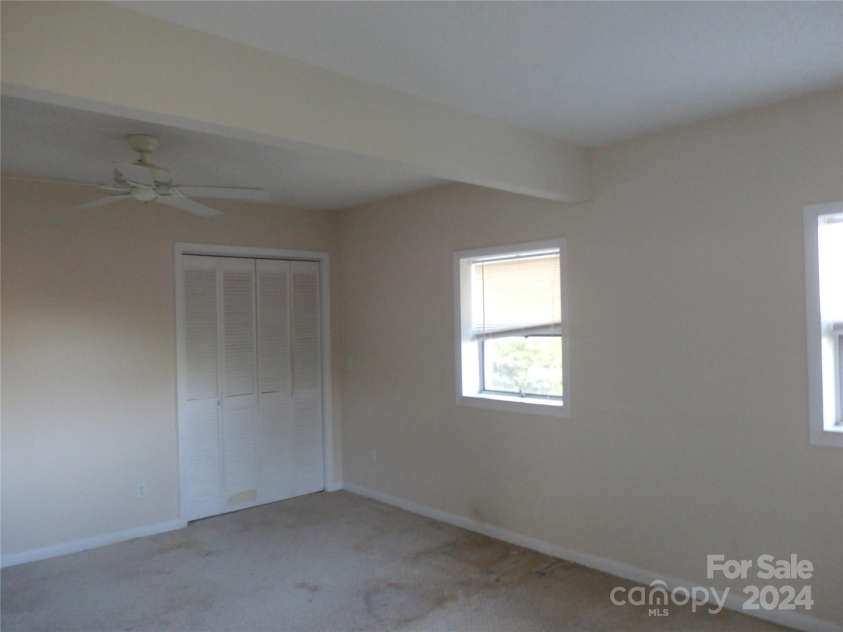 288 Firetower Road, Spruce Pine, NC 28777.  MLS# CAR4135750, YatesRealty ID 5896. Lower level bedroom