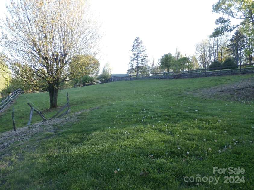 288 Firetower Road, Spruce Pine, NC 28777.  MLS# CAR4135750, YatesRealty ID 5896. Pasture area