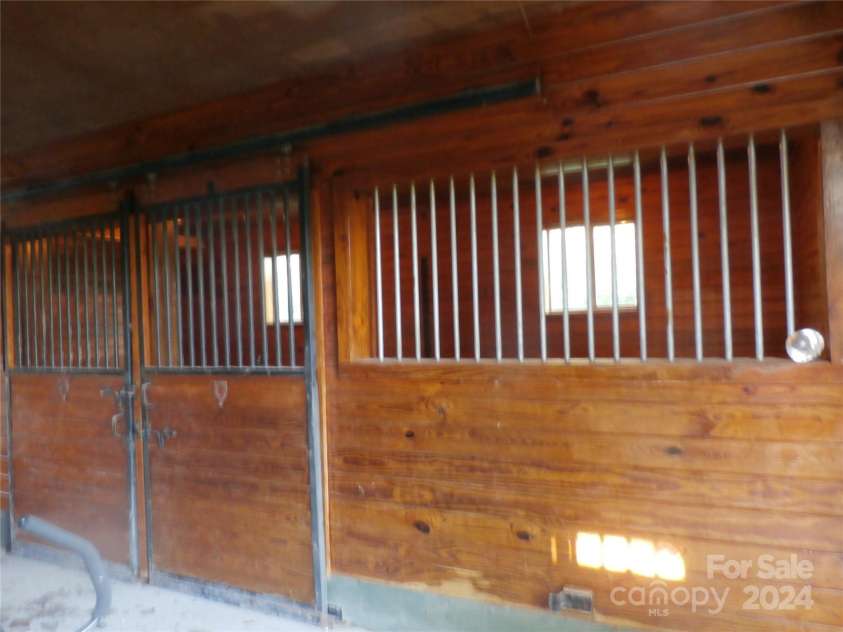 288 Firetower Road, Spruce Pine, NC 28777.  MLS# CAR4135750, YatesRealty ID 5896. Stalls with mats