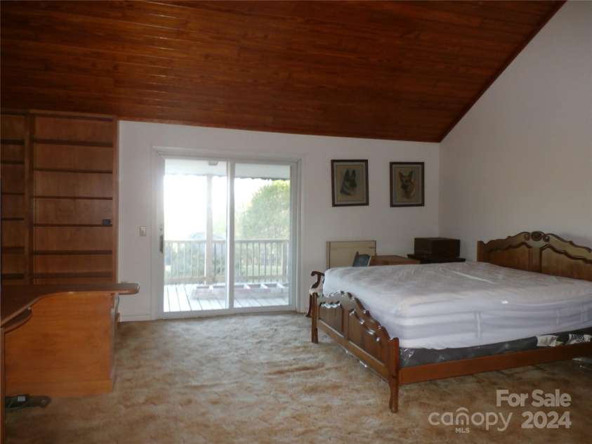 288 Firetower Road, Spruce Pine, NC 28777.  MLS# CAR4135750, YatesRealty ID 5896. Upstairs bedroom