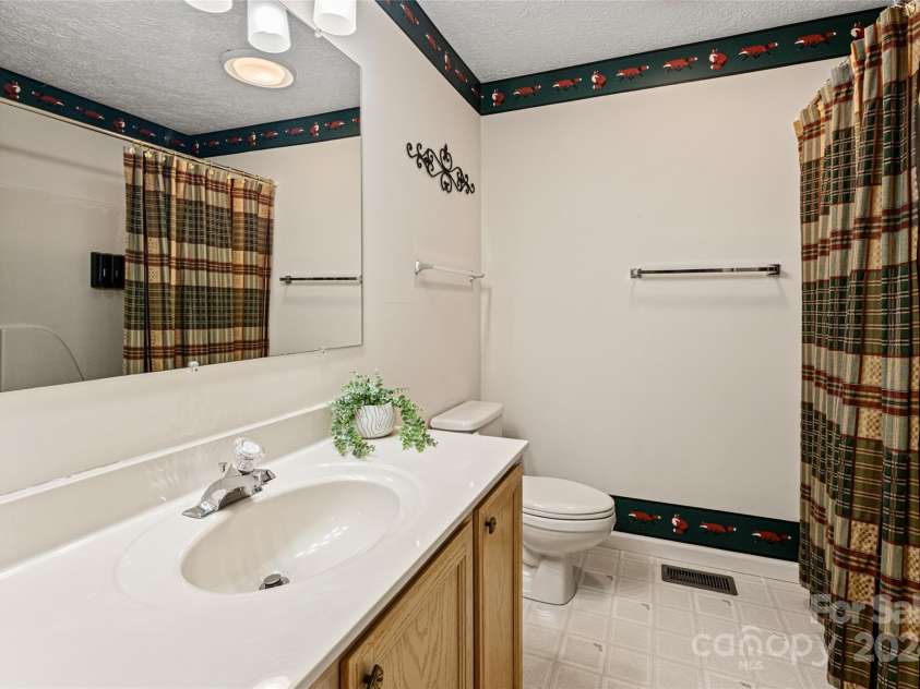 572 South Drive, Lake Lure, NC 28746.  MLS# CAR4173890, YatesRealty ID 5897. 