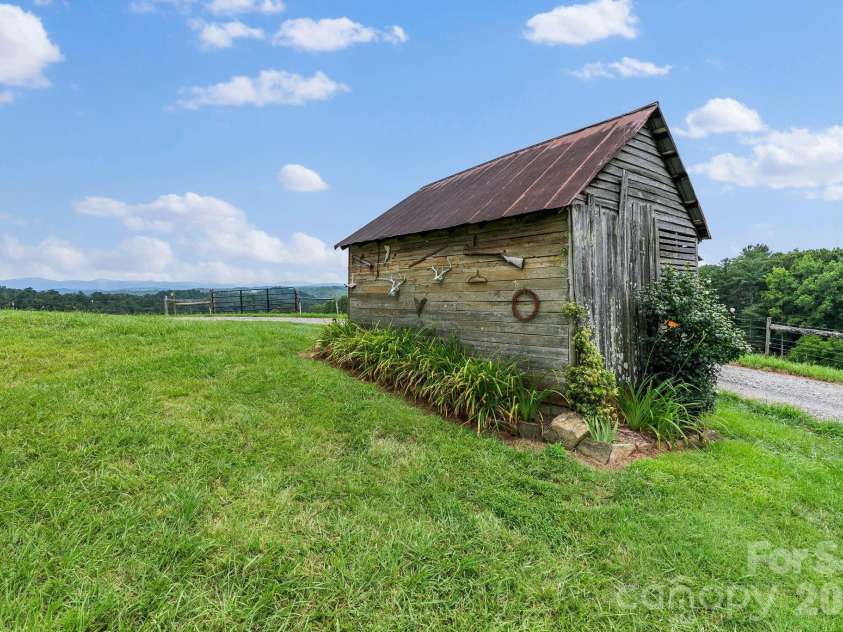 1045 & 1047 Graham Road, Marshall, NC 28753.  MLS# CAR4280943, YatesRealty ID 59. Original corn crib 