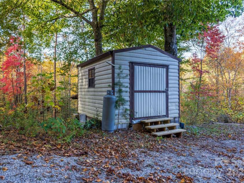 3929 Parker Padgett Road, Old Fort, NC 28762.  MLS# CAR4077370, YatesRealty ID 59. Nsulated Storage/Laundry Shed