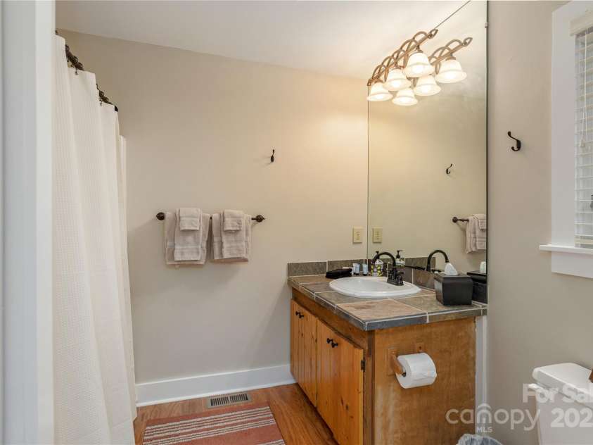 68 Qualla Trace, Lake Toxaway, NC 28747.  MLS# CAR4244456, YatesRealty ID 5906. Primary upstairs BA