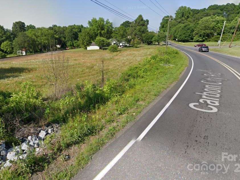 9999 Carbon City Road, Morganton, NC 28655.  MLS# CAR4218306, YatesRealty ID 591. Road view of lot