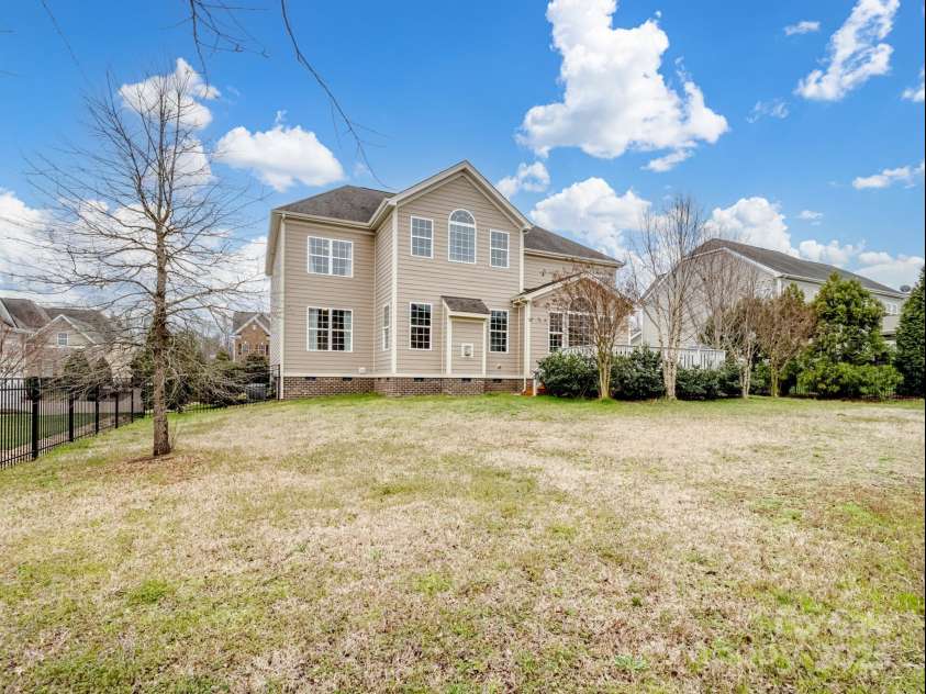 8509 Penton Place, Harrisburg, NC 28075.  MLS# CAR4216306, YatesRealty ID 5911. Full Fenced-In Backyard