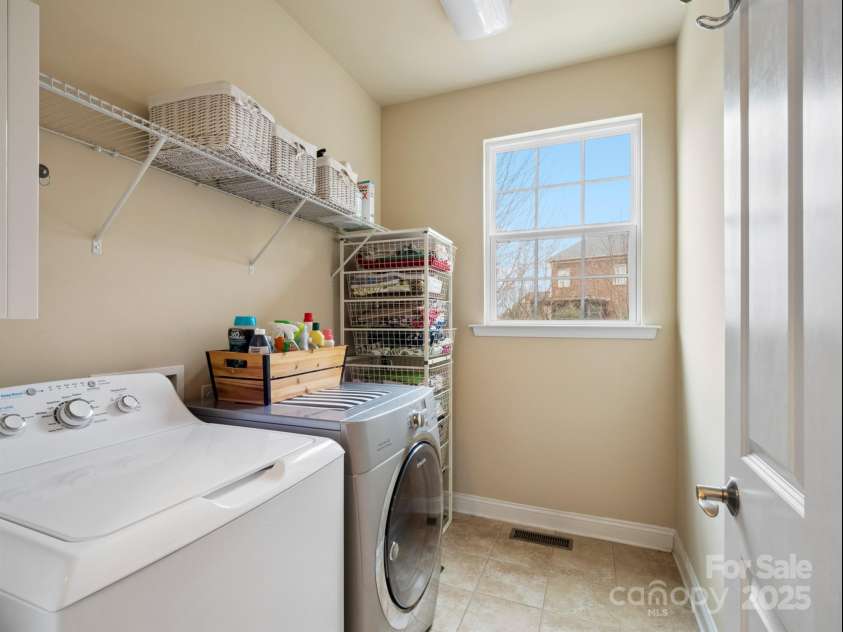 8509 Penton Place, Harrisburg, NC 28075.  MLS# CAR4216306, YatesRealty ID 5911. Laundry Room