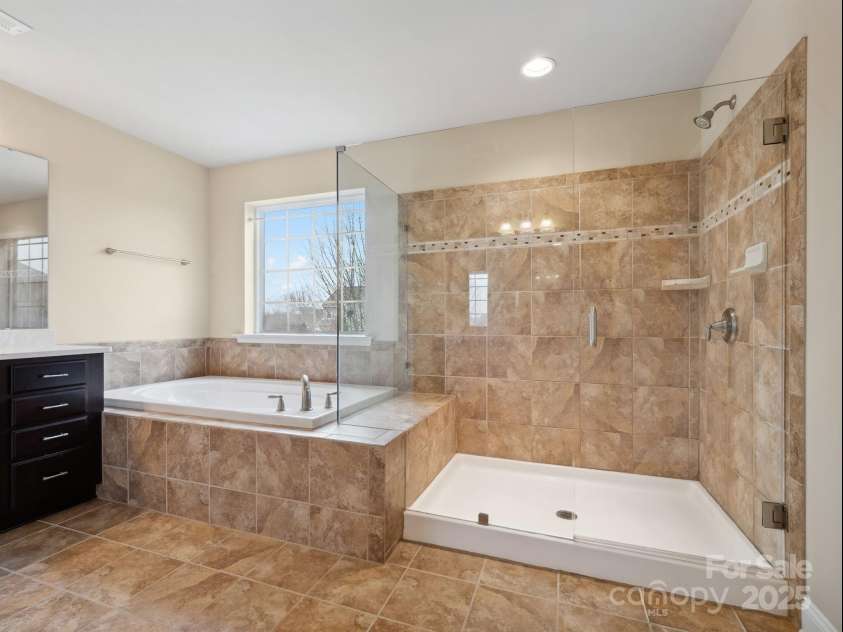 8509 Penton Place, Harrisburg, NC 28075.  MLS# CAR4216306, YatesRealty ID 5911. Primary Bathroom