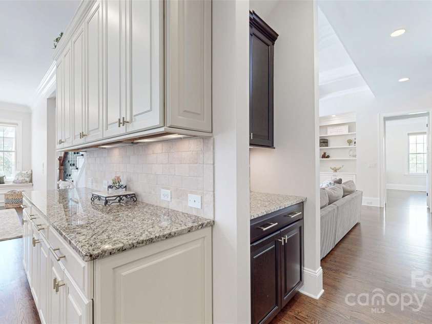 819 Beauhaven Lane, Waxhaw, NC 28173.  MLS# CAR4242522, YatesRealty ID 5915. Extra Service Bar w/Storage off Dining Room